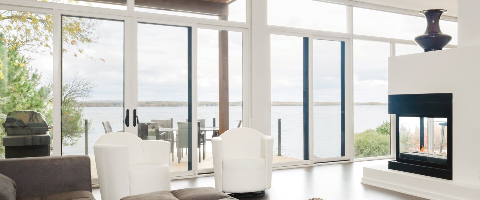 Ultra Series multi-slide doors mulled with stationary panels.