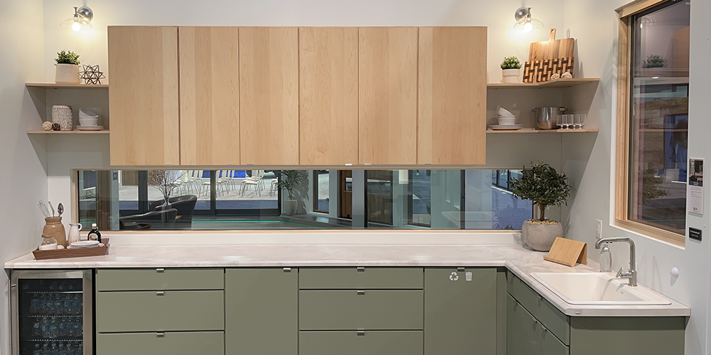 Beveled direct set beneath a row of kitchen cabinets